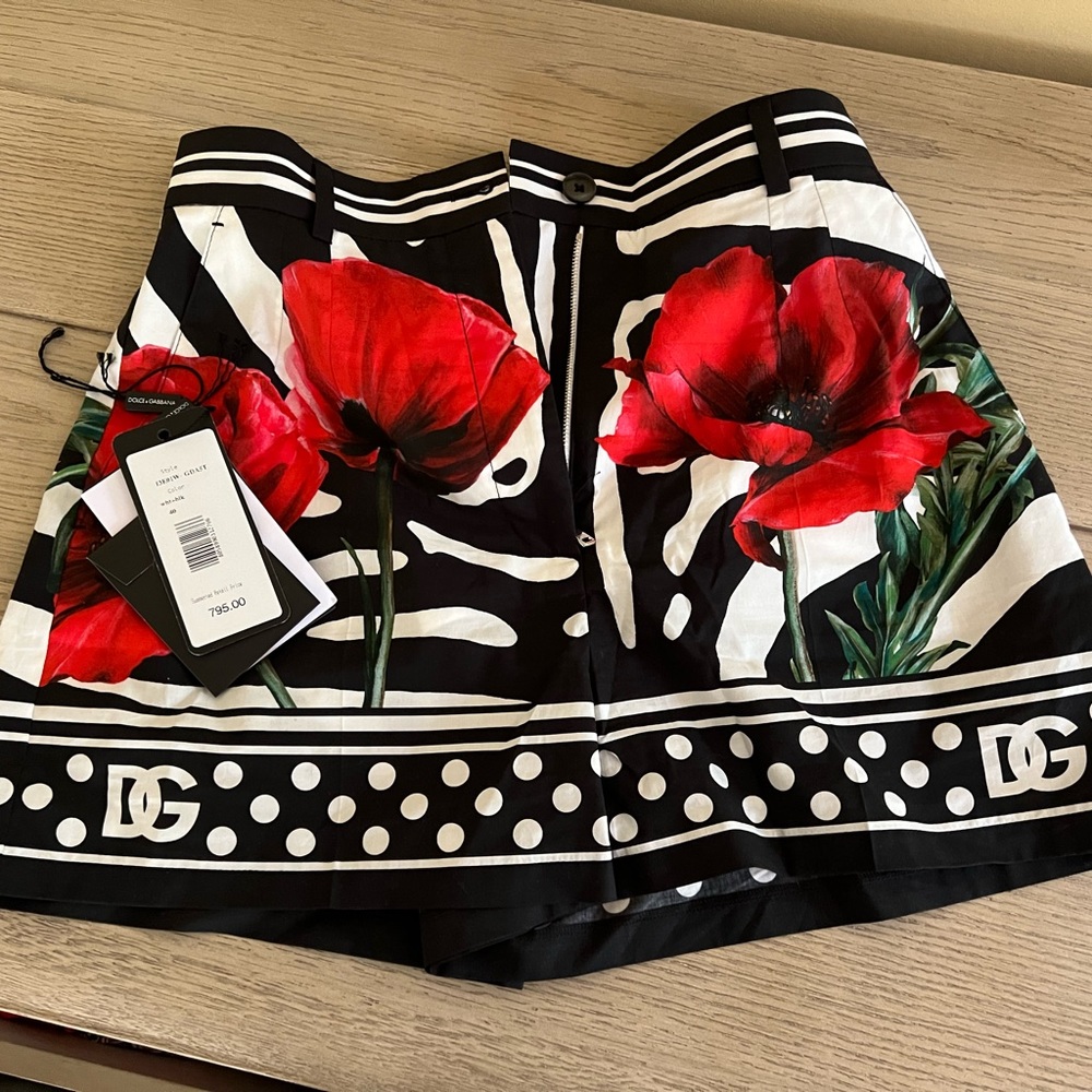 Dolce and Gabbana shorts. Size 40. Like a 4. Wore one time. Have buttons and tag